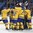 BUFFALO, NEW YORK - JANUARY 4: Sweden players celebrate after a 4-2 semifinal round win over the U.S. at the 2018 IIHF World Junior Championship. (Photo by Matt Zambonin/HHOF-IIHF Images)

